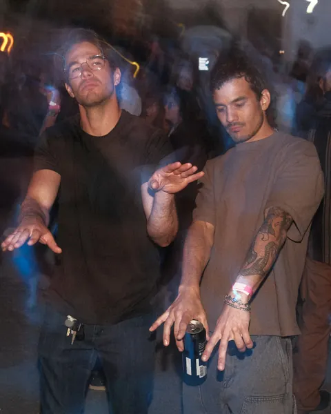 Friends dancing together at a party